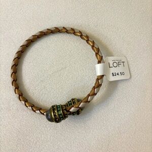 NWT LOFT gold white band with purple and green crystals and black stone